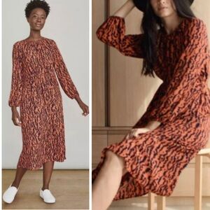 Elizabeth and James Midnight Blue and Orange Cinch Waist Long Sleeve Midi Dress